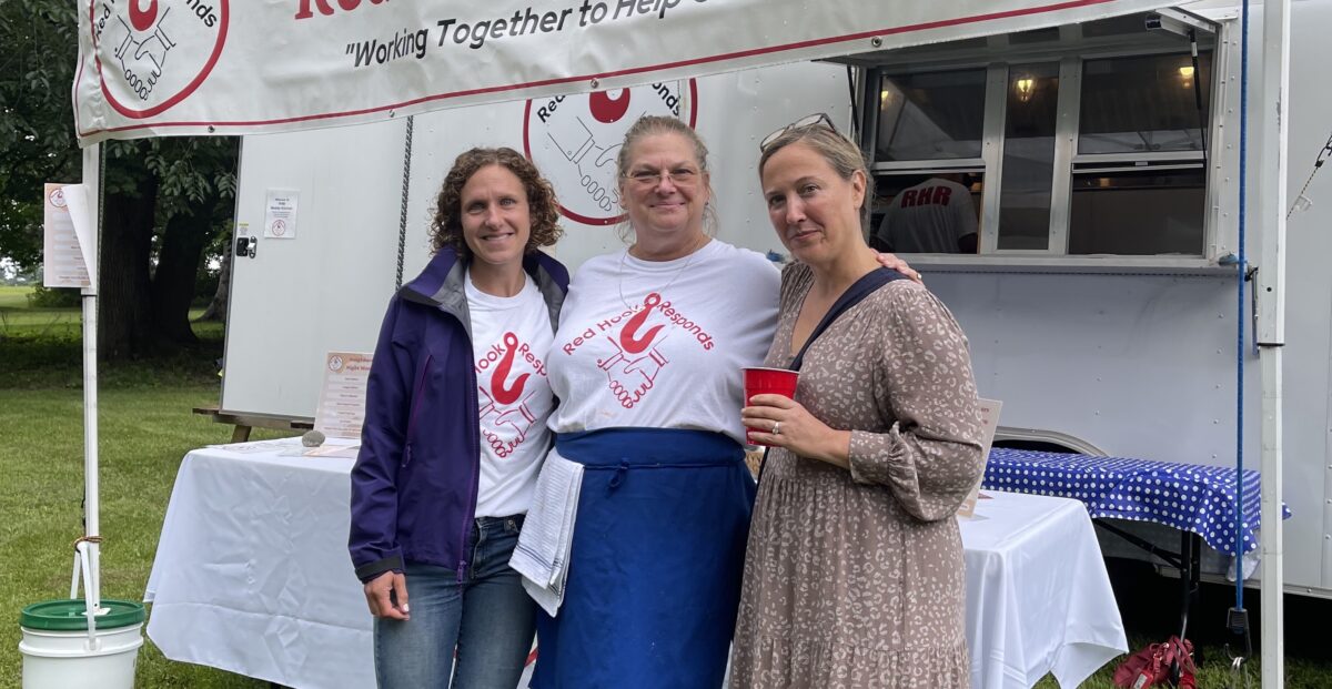 Image of Bianca Verrilli, Leslie Pulver, and Madison Curry, RHR's executive director, executive chef, and volunteer coordinator respectively.